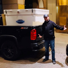 1100-Quart-Ice-Chest-In-Back-of-Truck-300x300.jpg