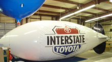 30ft-blimp-with-Interstate-Toyota-banner-300x166.jpg