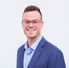 Tompkins-headshot-400x400-254431a8.jpg